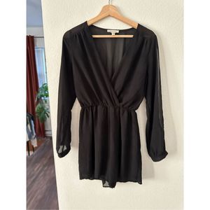 Monteau black chiffon romper with open arm slits and deep vneck